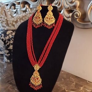 Vibrant Red Multi-Strand Necklace with Gold Pendant
